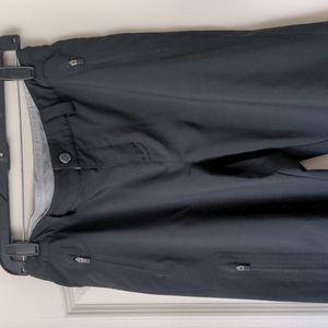 REI hiking pants, tons of features